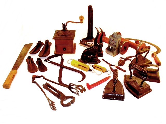 Variety of Vintage and Antique Cast Iron Implements and Tools