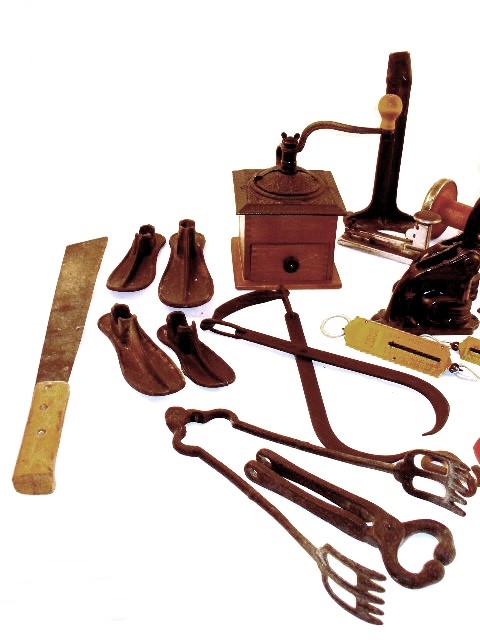 Variety of Vintage and Antique Cast Iron Implements and Tools