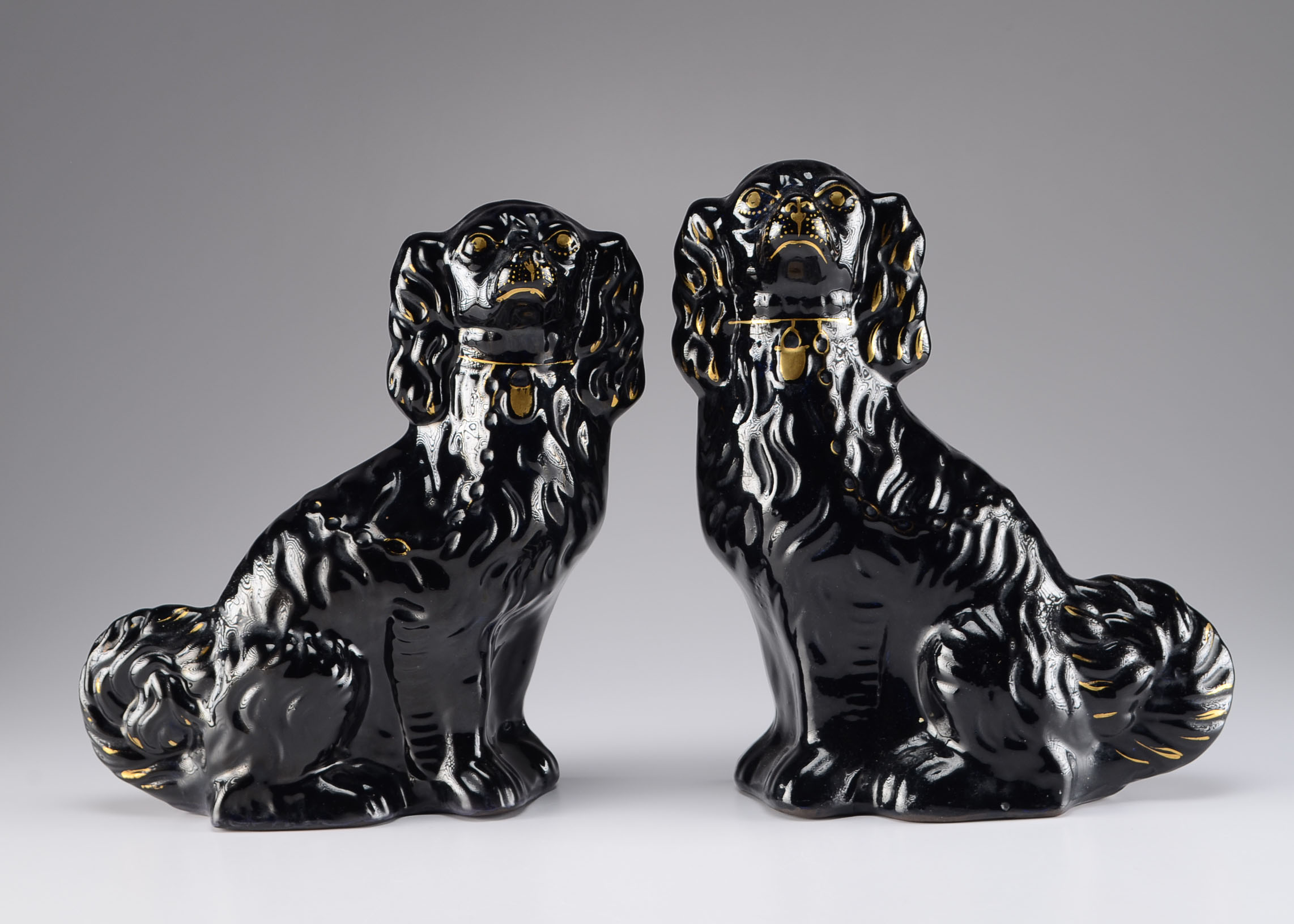 Pair of Rare Black Glaze Staffordshire Dogs
