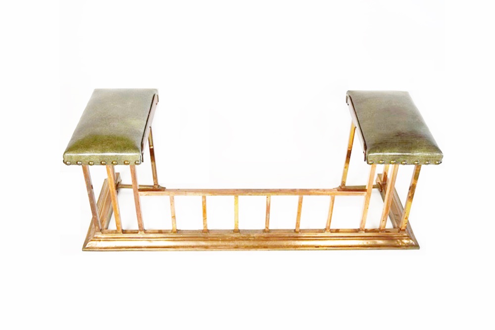 A Copper Fireplace Fender with Bench Seating at Each Side