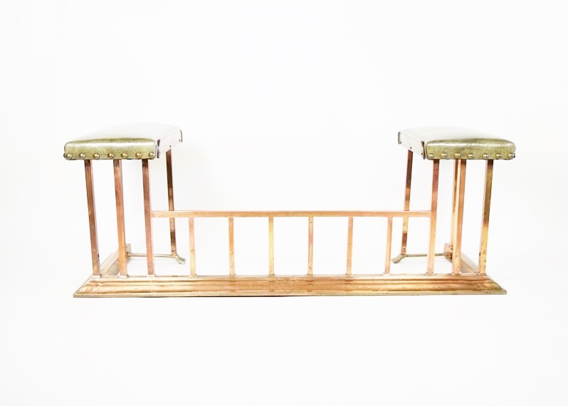 A Copper Fireplace Fender with Bench Seating at Each Side