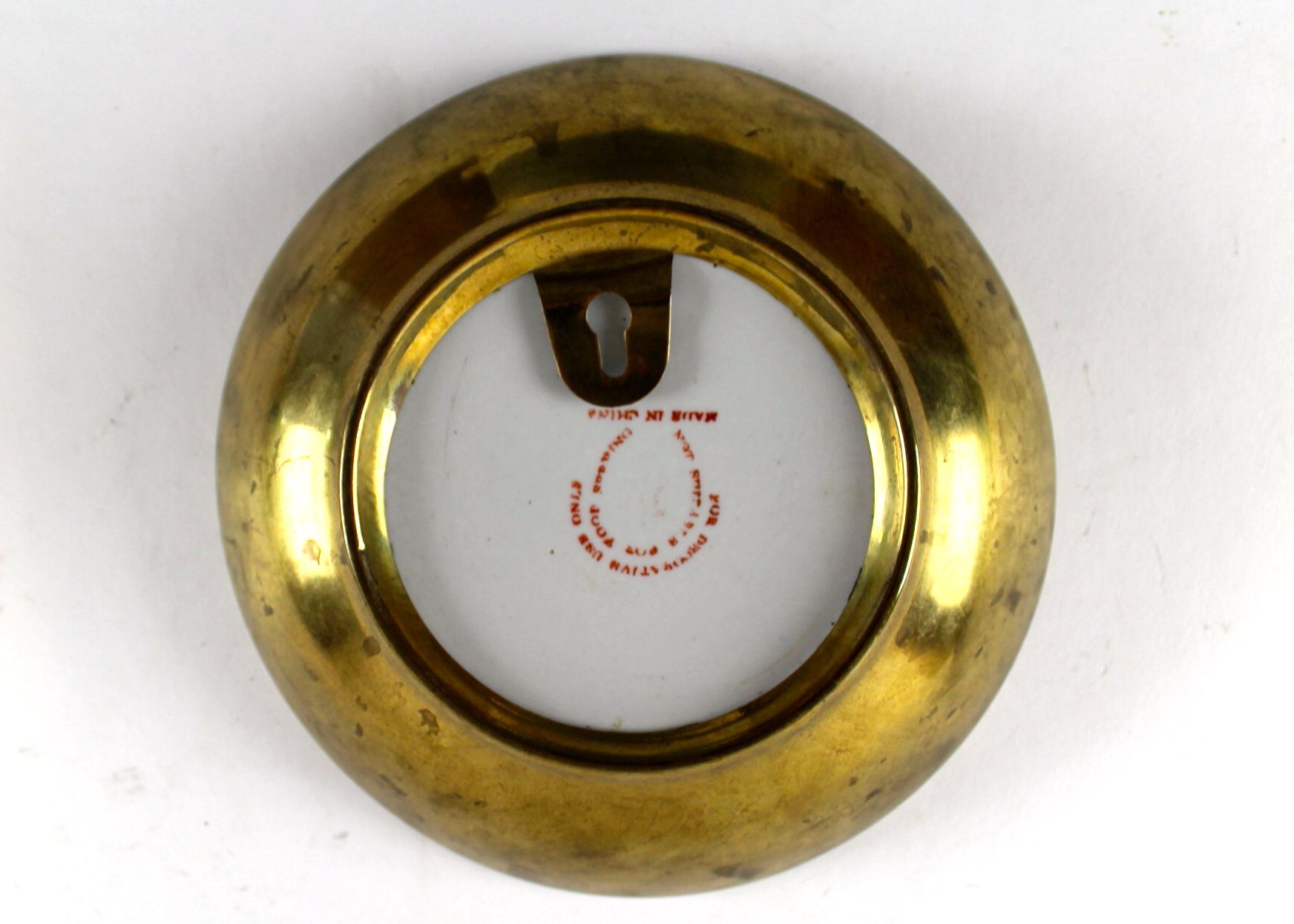 Four Hand-Painted Porcelain Plates