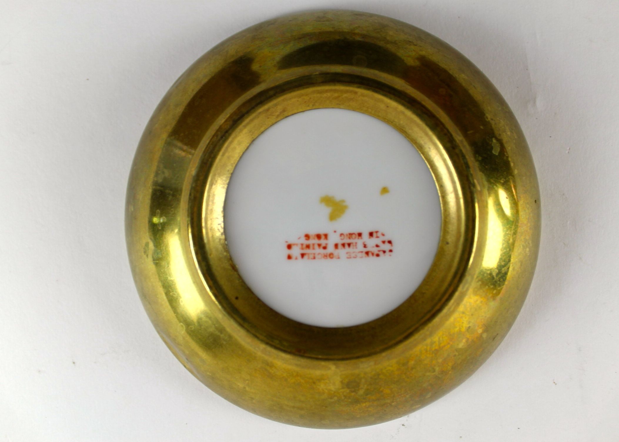 Four Hand-Painted Porcelain Plates