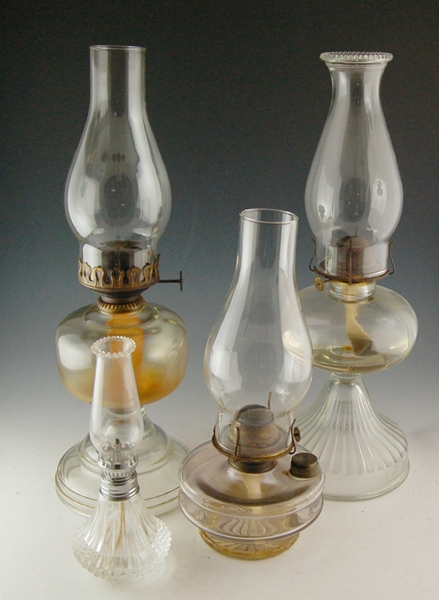 Four Glass Oil Lamps