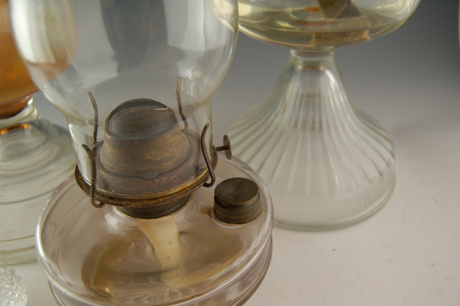 Four Glass Oil Lamps