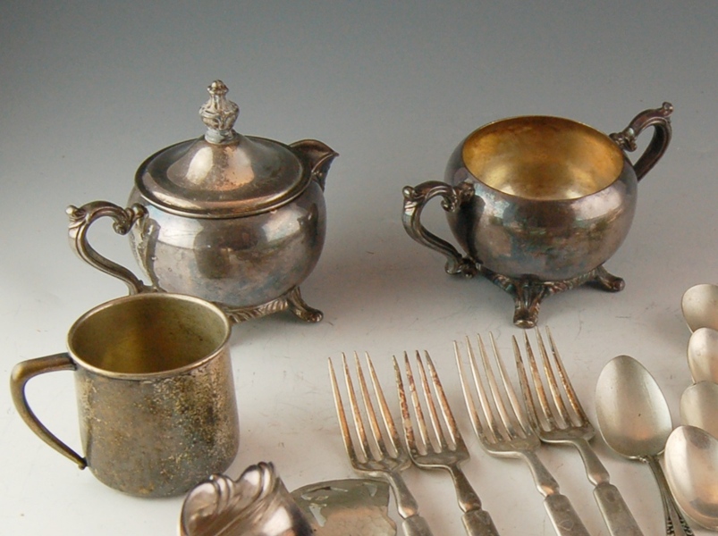 Stainless and Silverplate Flatware, Creamer and Sugar, and Ladle