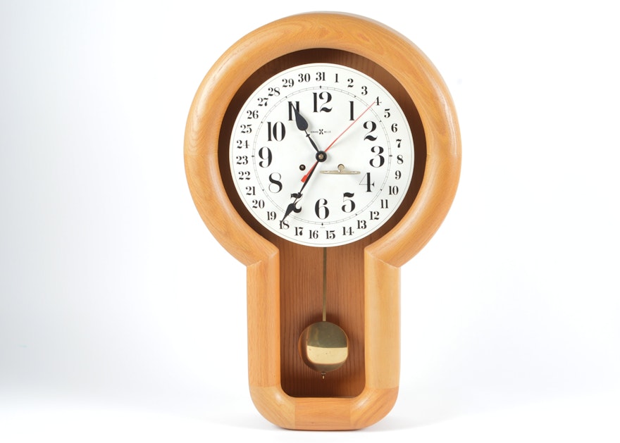 Vintage Howard Miller Oak Wall Clock with Eight Day Wind Pendulum