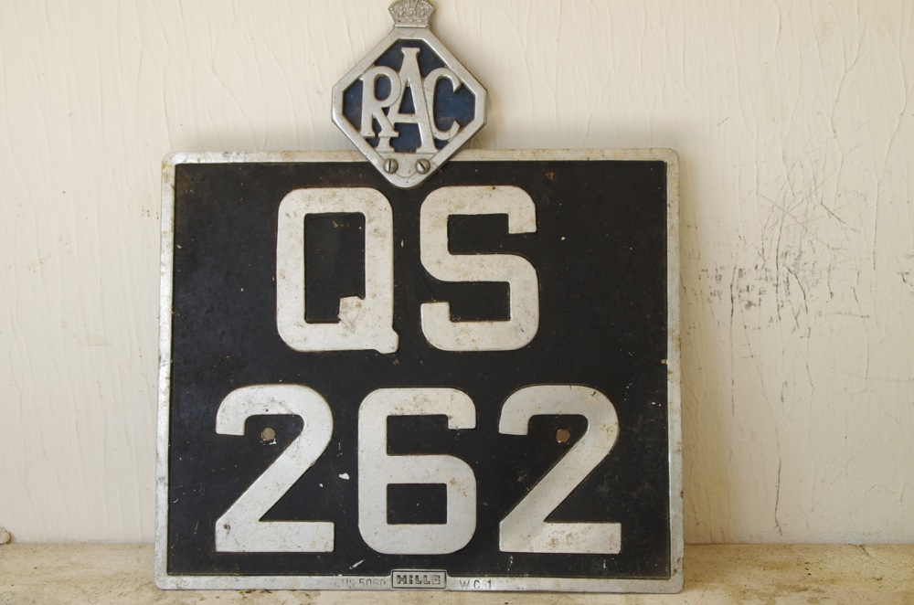 Automotive Supplies with Vintage License Plate from Great Britain