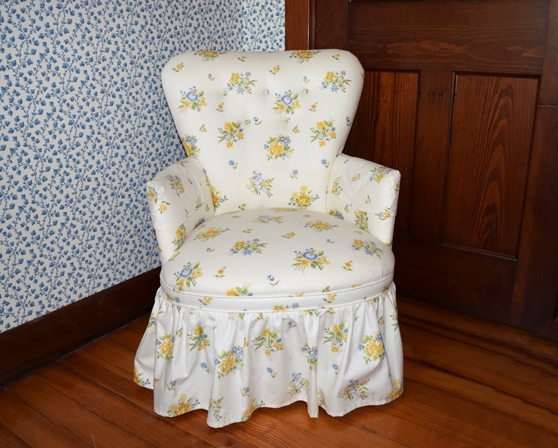 A Petite Boudoir Chair Upholstered in a Sweet Floral Print