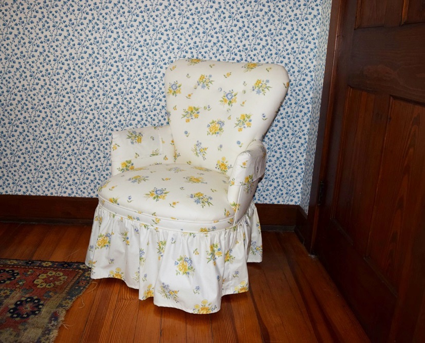 A Petite Boudoir Chair Upholstered in a Sweet Floral Print