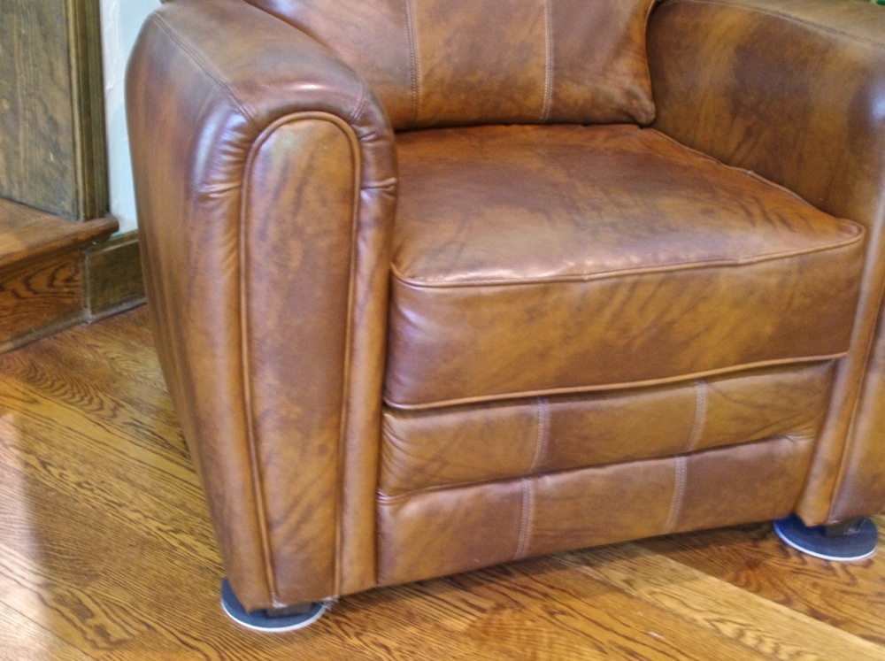 Large Recliner with Brown Naugahyde Upholstery