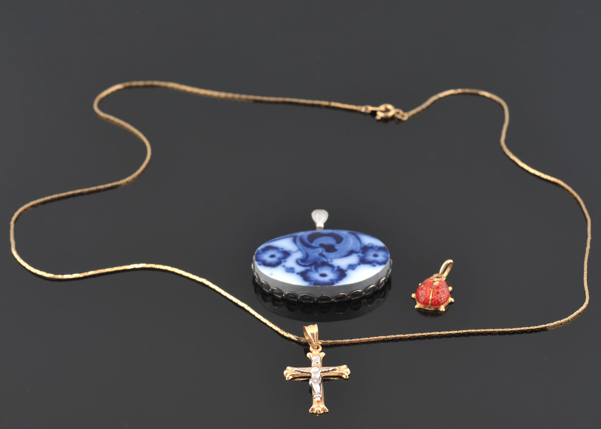 14 K Crucifix Pendant, 14 K Ladybug Pendant and Flow Blue Pendant