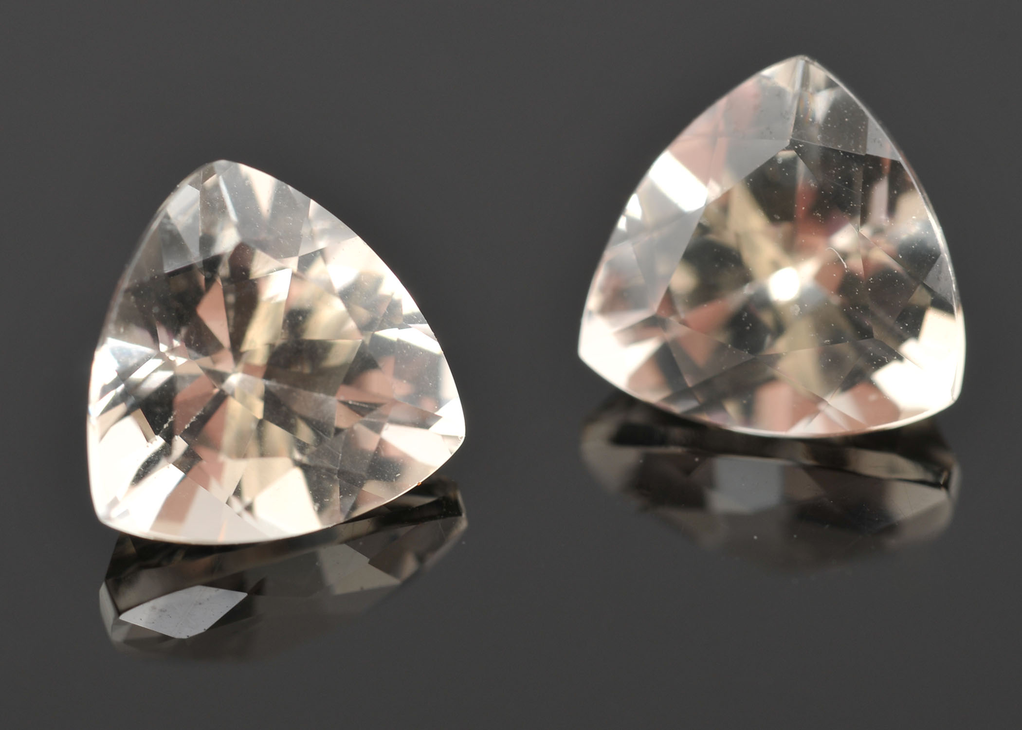 Two Loose 2.75 Carat Total Weight Yellow Labradorite Gemstones