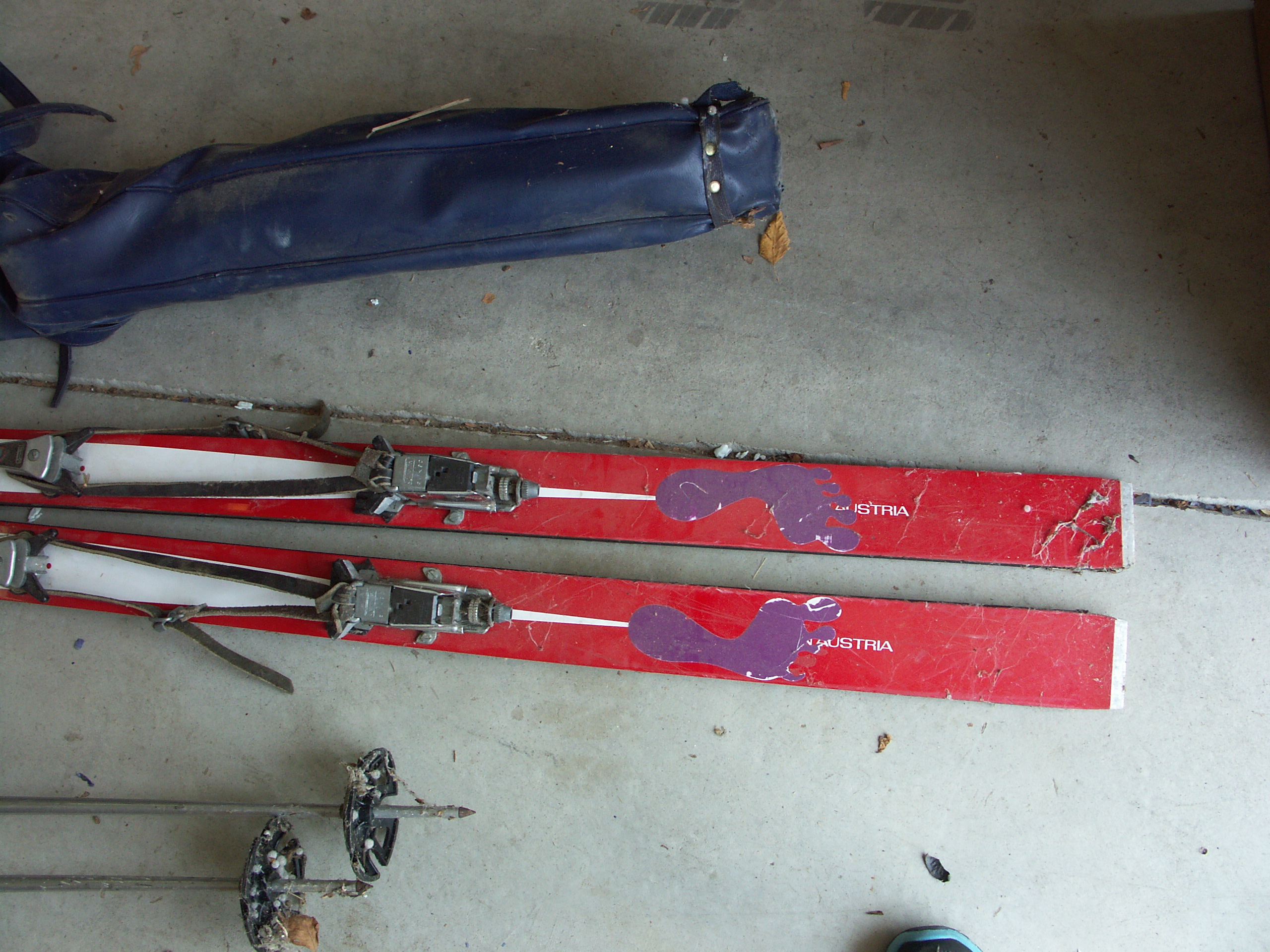 Lot of Vintage Skis and Pair of Ski Poles