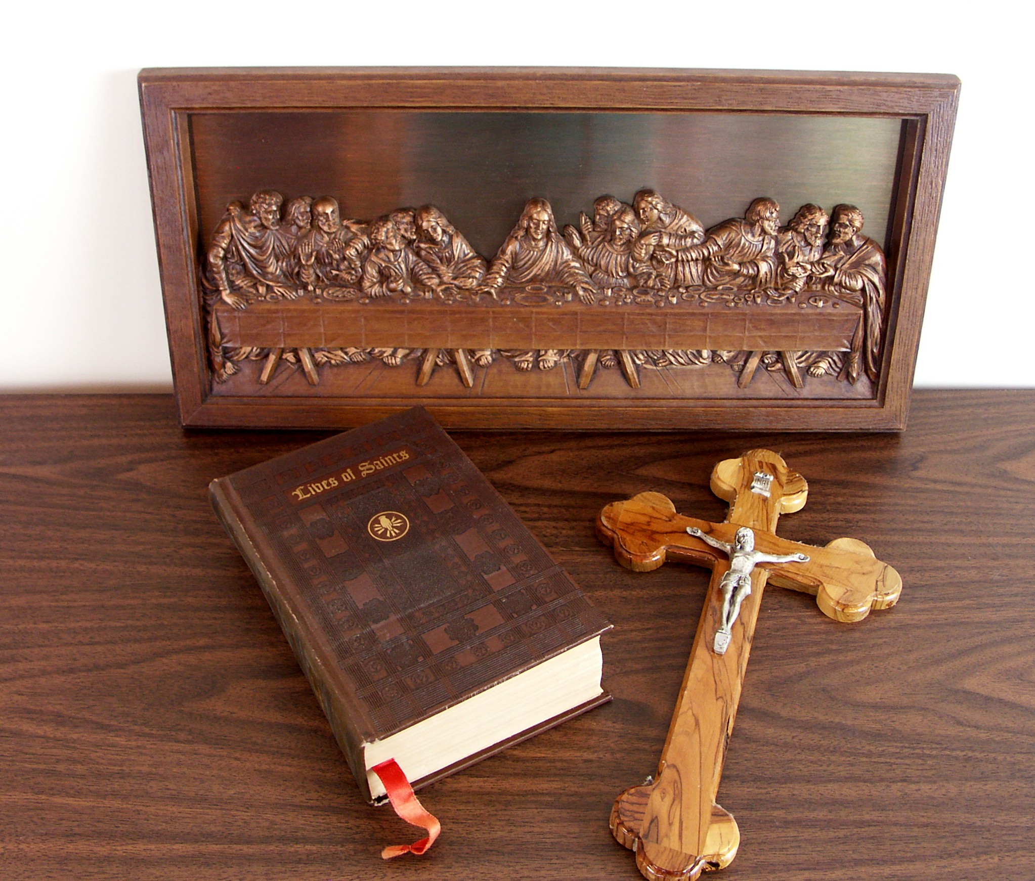 Copper Religious Print, Crucifix, and Saints Book