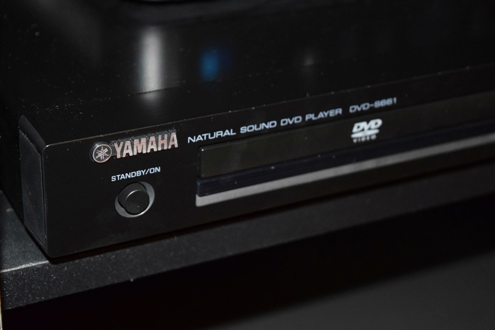 A Sony Bravia 32" Class Digital TV, Stand and Yamaha DVD Player