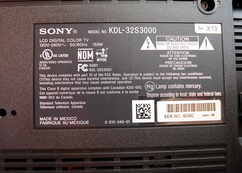 A Sony Bravia 32" Class Digital TV, Stand and Yamaha DVD Player