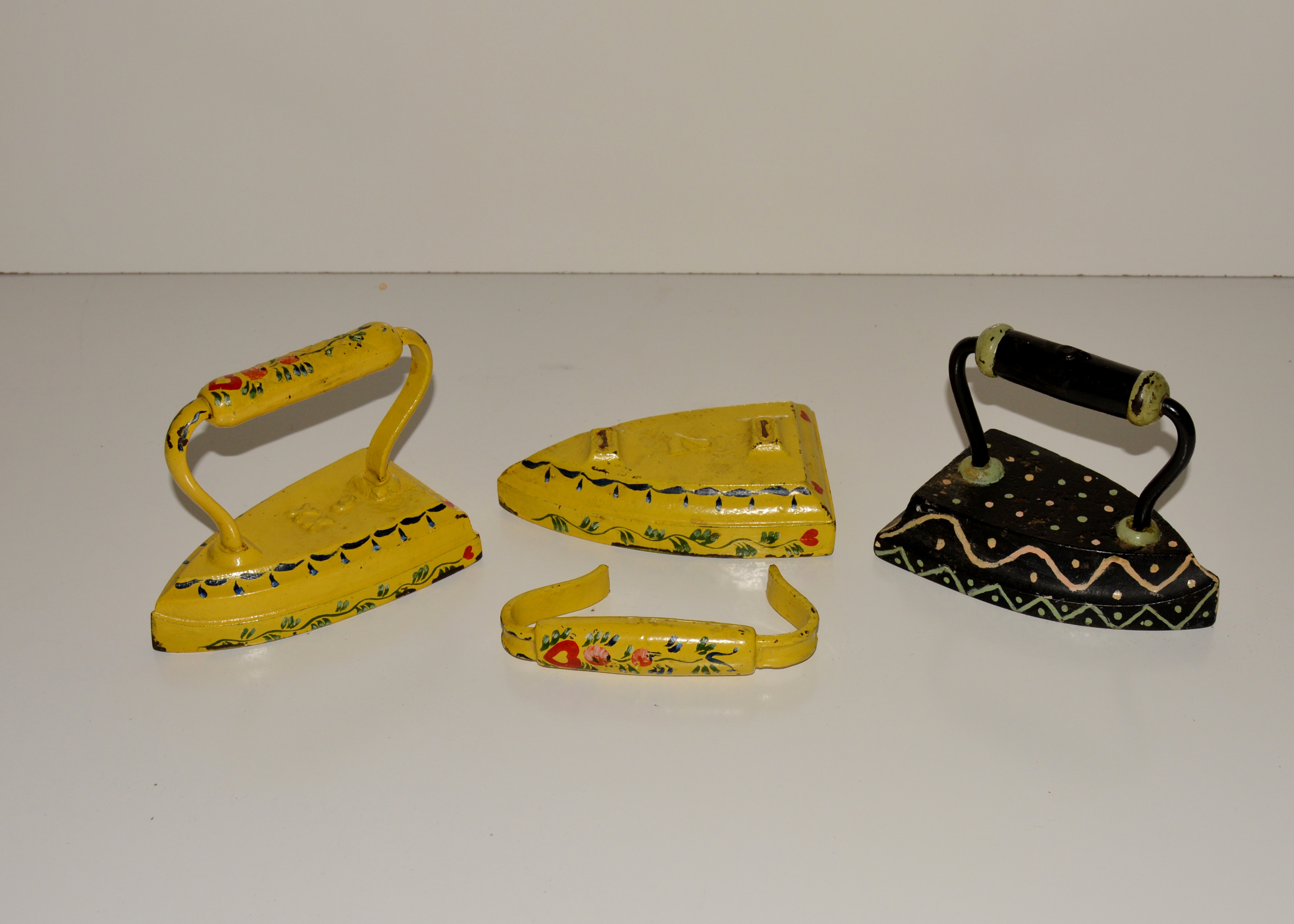 Three Vintage Painted Metal Irons