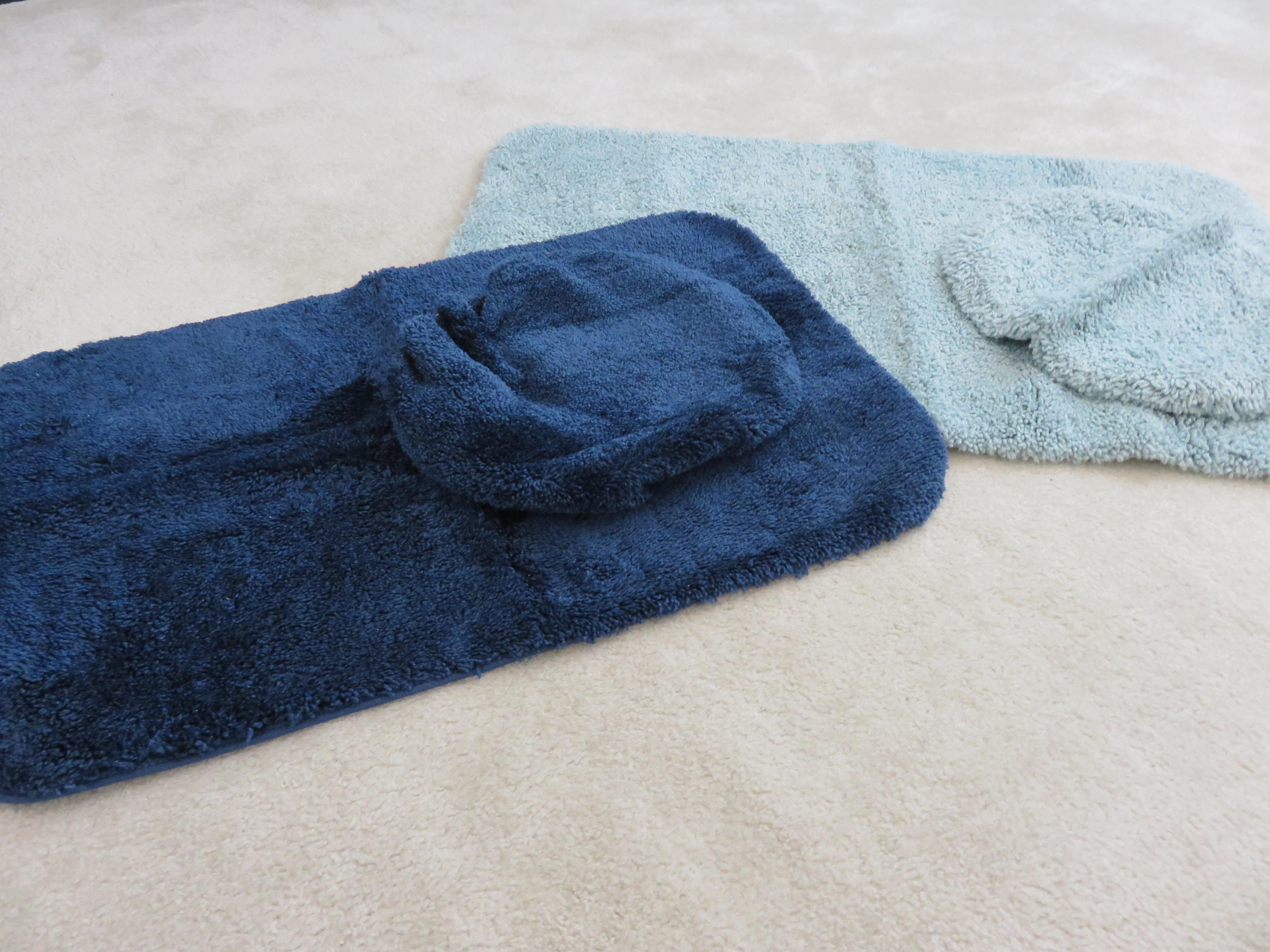 Two Bath Rug Sets