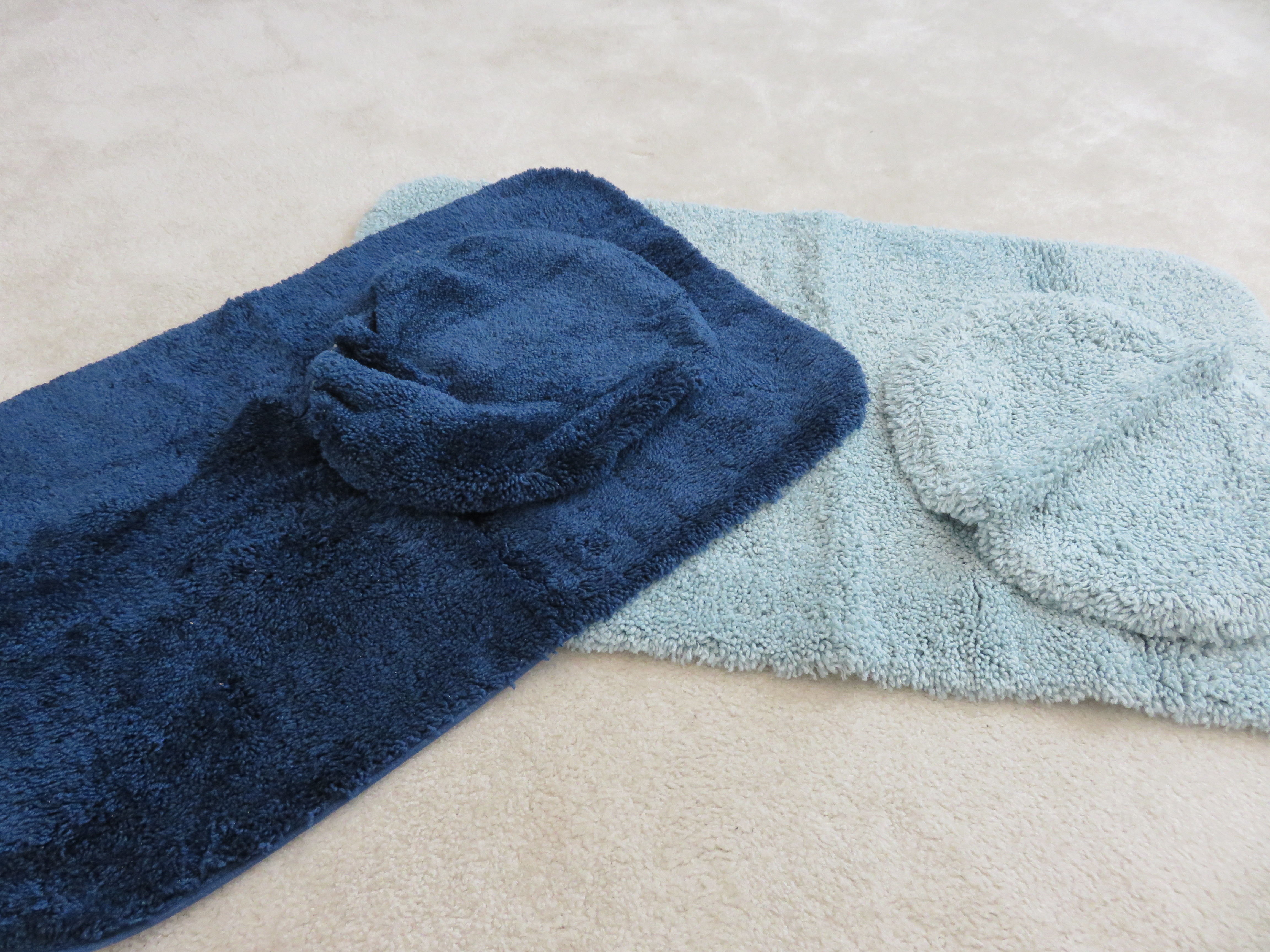 Two Bath Rug Sets