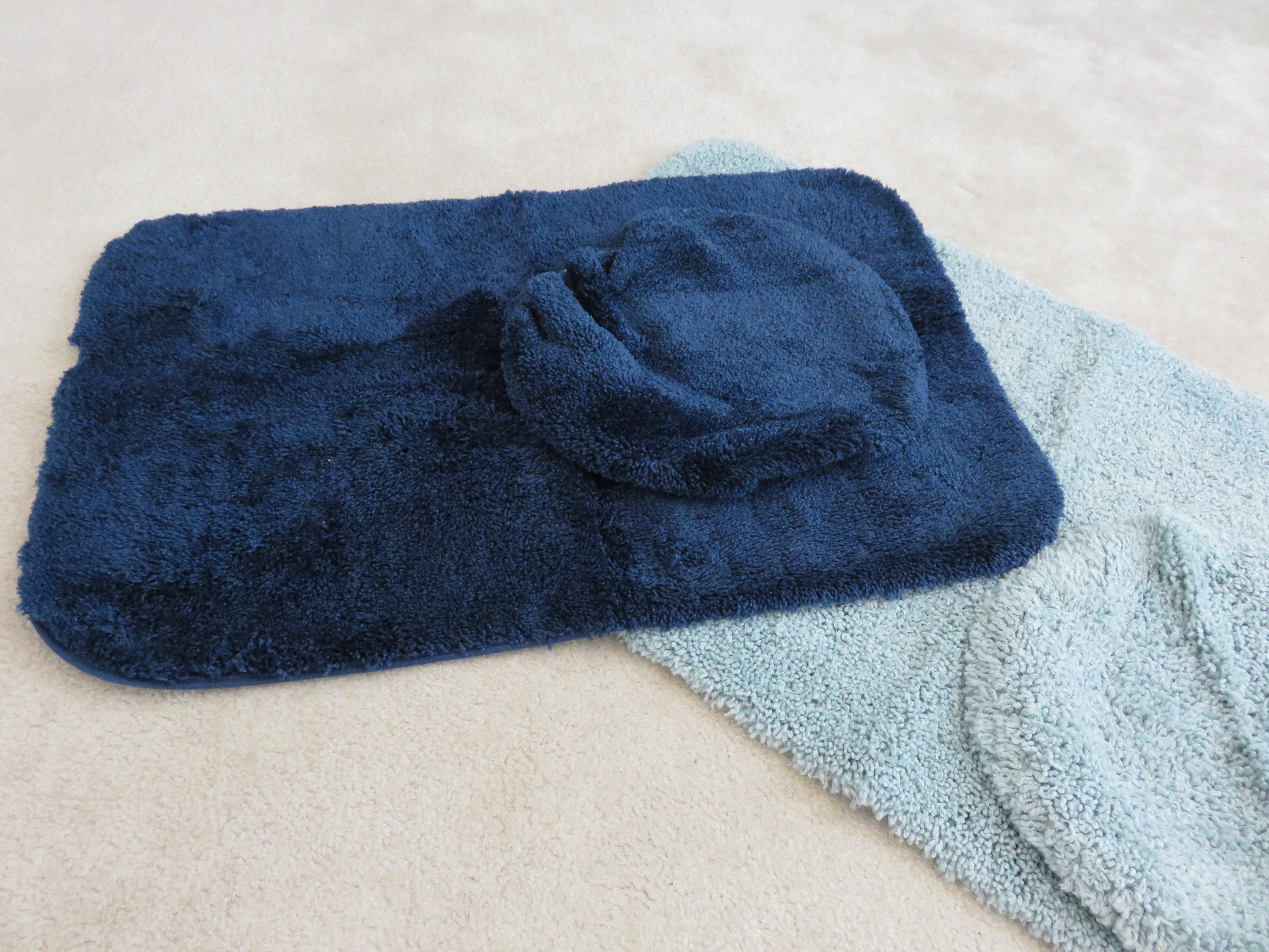 Two Bath Rug Sets