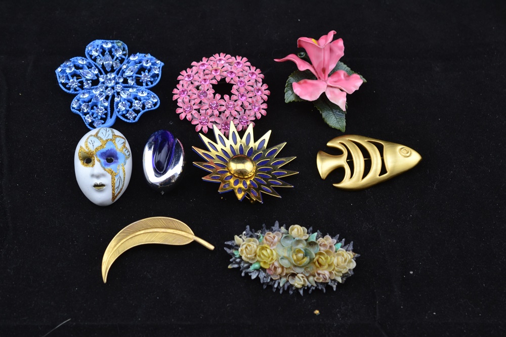 A Group Of Nine Vintage Brooches