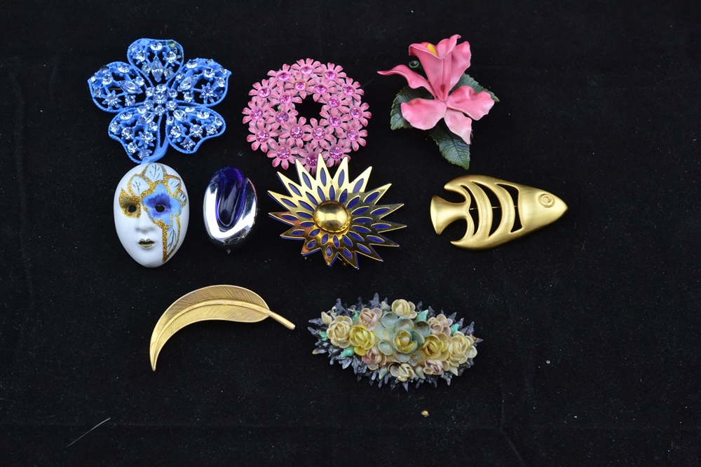 A Group Of Nine Vintage Brooches