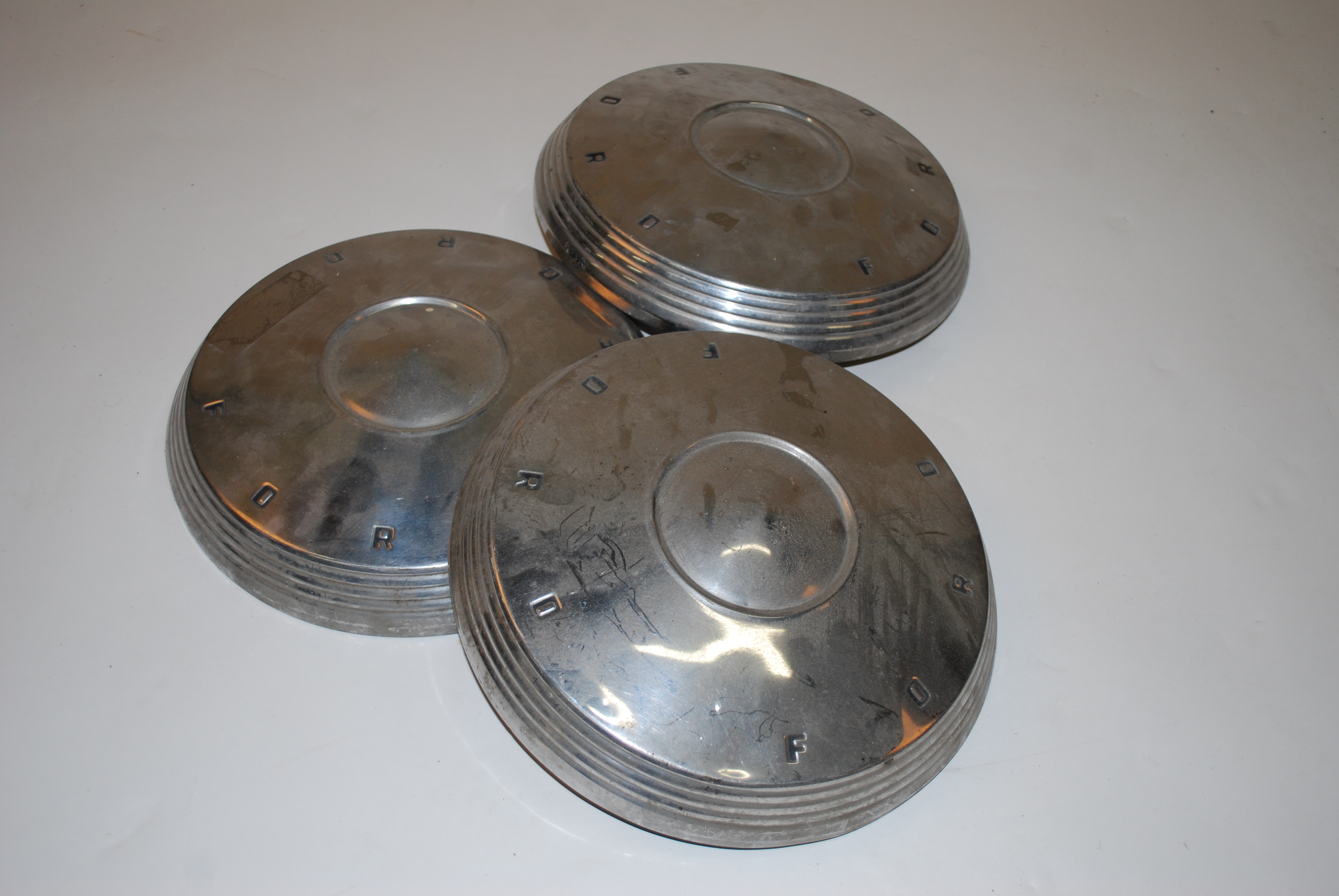 Set of Three Vintage Ford Hubcaps