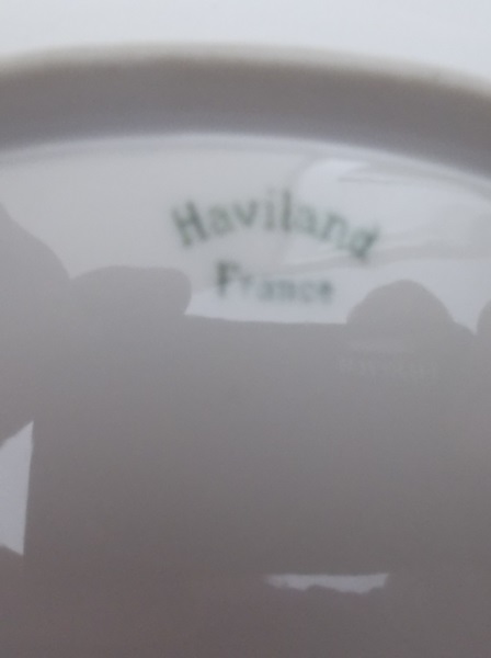 Haviland and Limoges Plates on Louis XVI Style Plate Display 