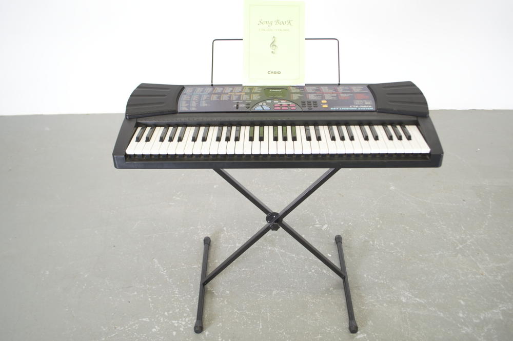Casio Electric Keyboard with Stand