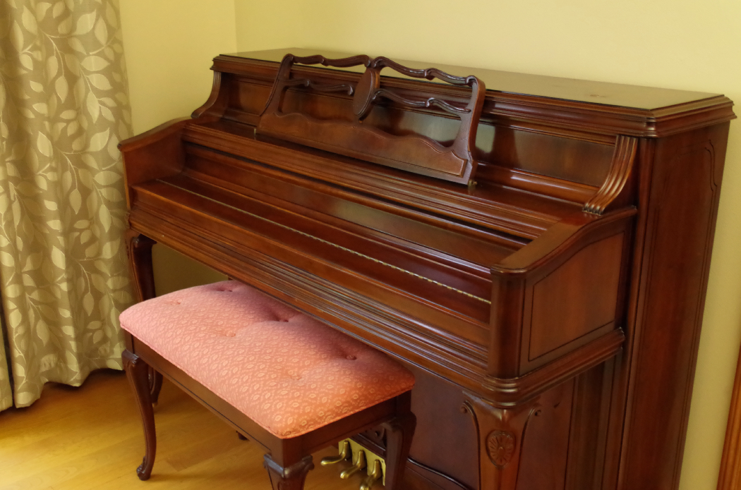 Wurlitzer Upright Piano in Cherry Cabinet