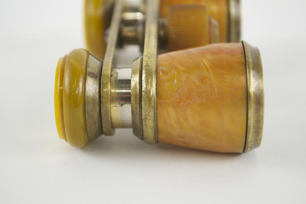 Small Orange Pearlized Plastic and Brass Binoculars