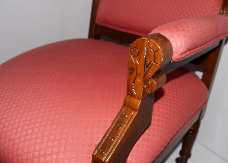 A Victorian Eastlake Corner Chair Upholstered in Soft Red Fabric