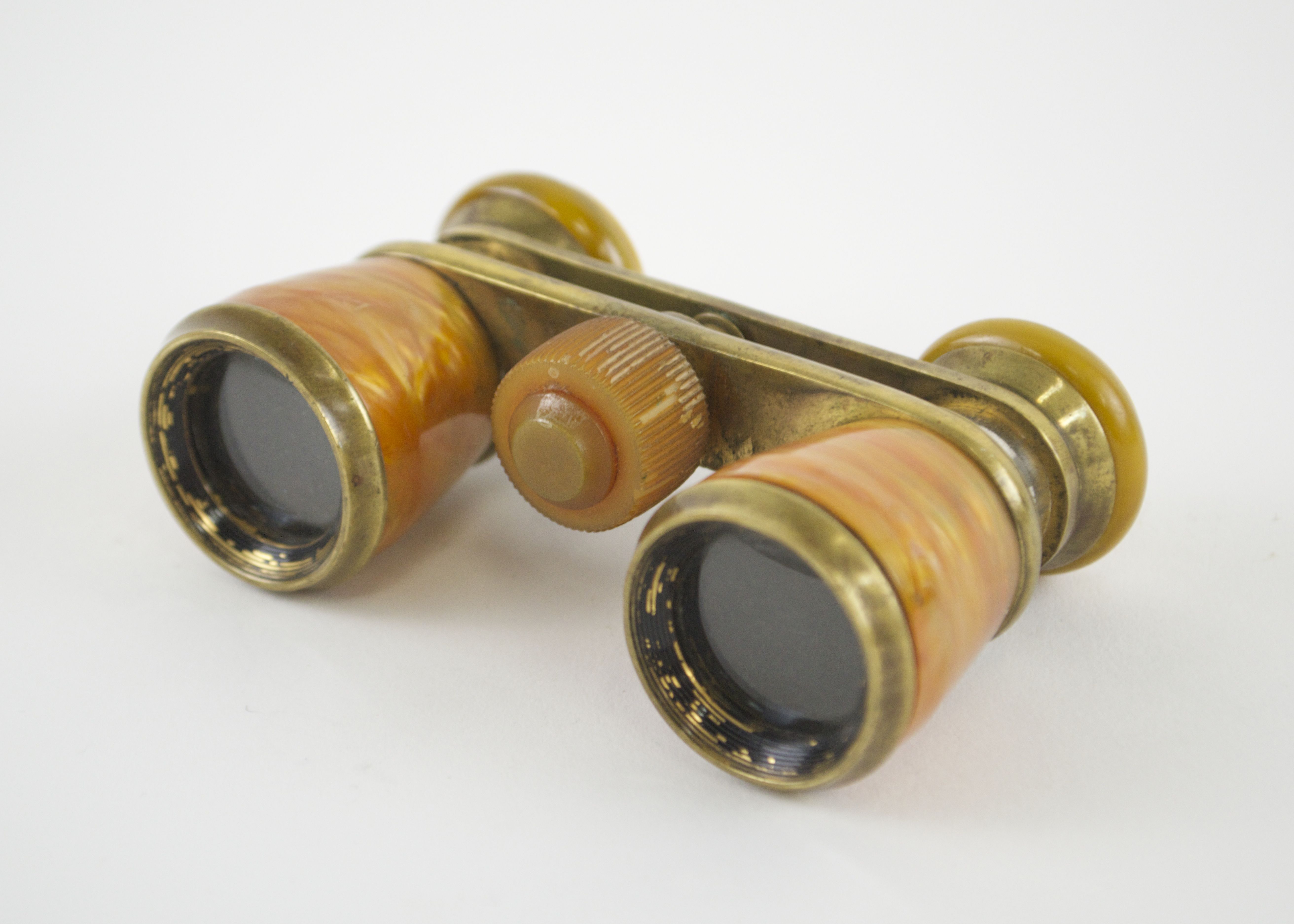 Small Orange Pearlized Plastic and Brass Binoculars