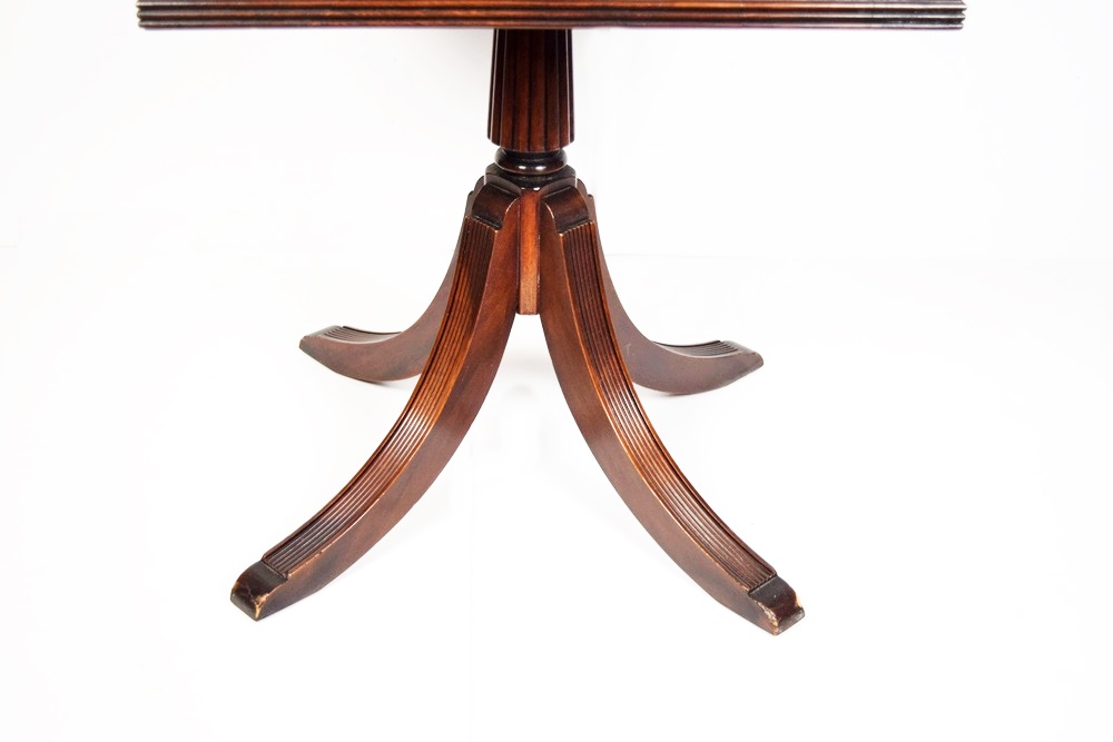 A Vintage Duncan Phyfe Style Rotating Book Table