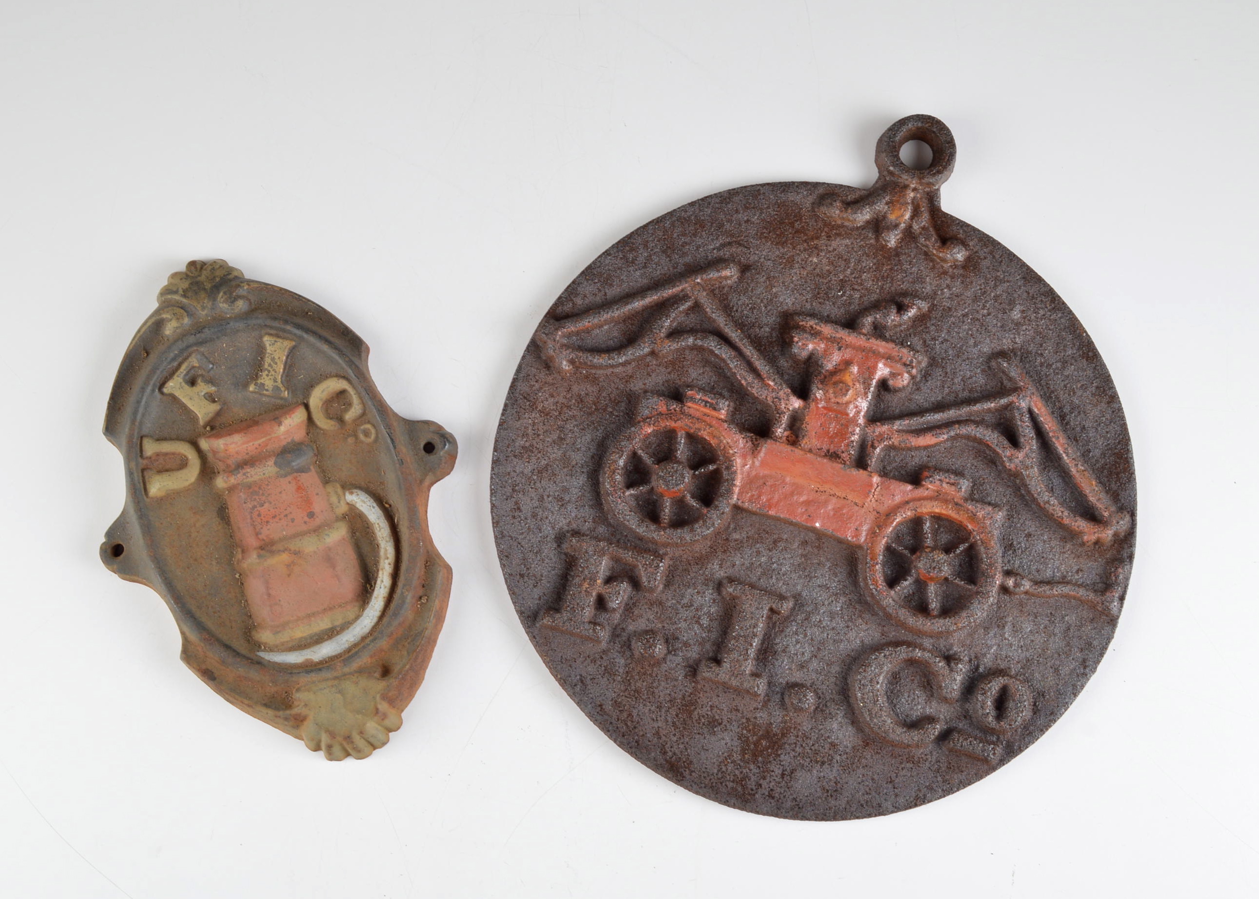 Pair of Fire Insurance Cast Iron Markers