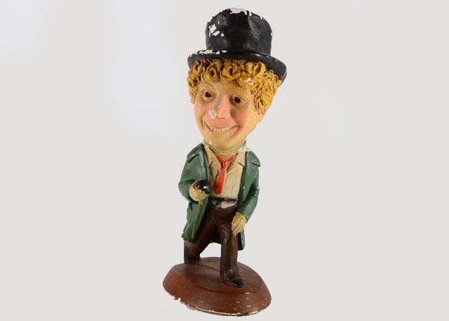 A Cast Plaster Harpo Marx Statue