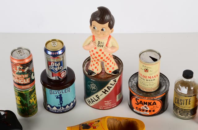 An Assortment of Vintage Tins, Cans, and Other Items