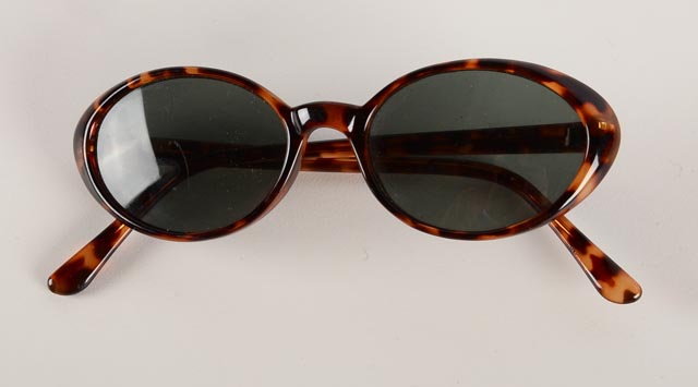 An Assortment of Vintage Tins, Cans, and Other Items