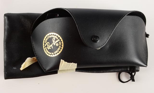 An Assortment of Vintage Tins, Cans, and Other Items