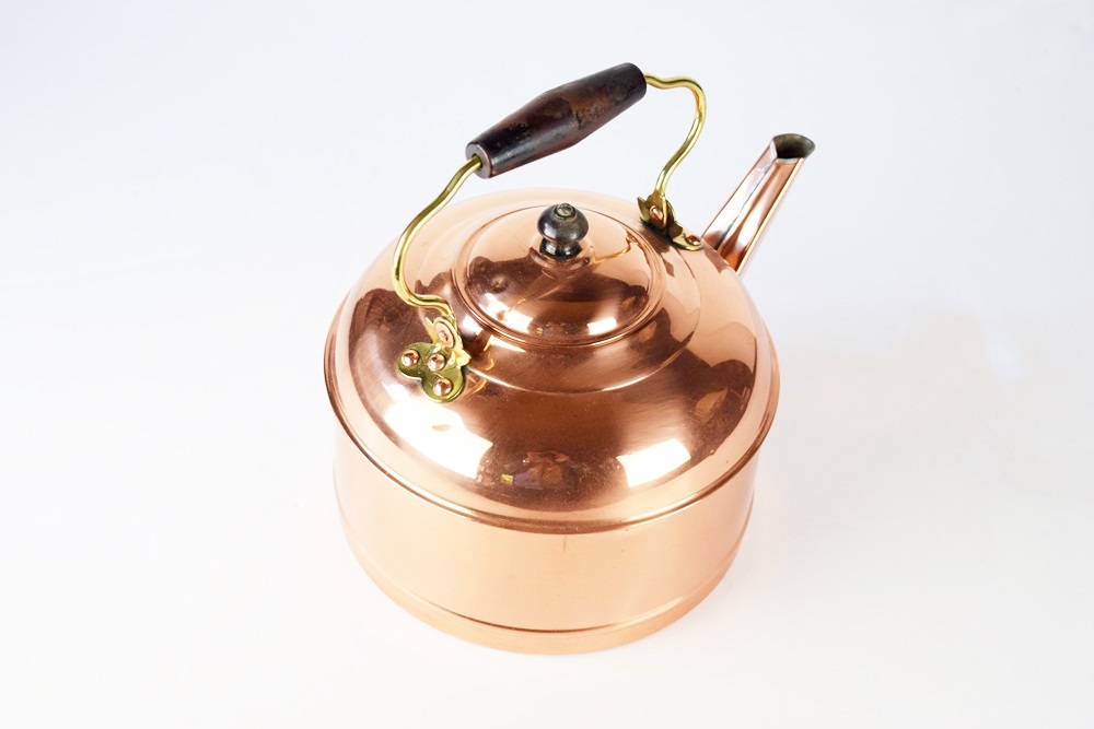 An Antique Copper Tea Kettle Made by Rome Copper Co.