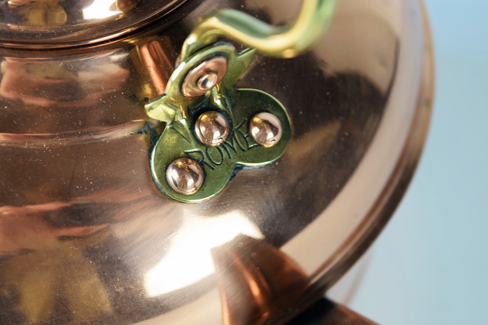 An Antique Copper Tea Kettle Made by Rome Copper Co.