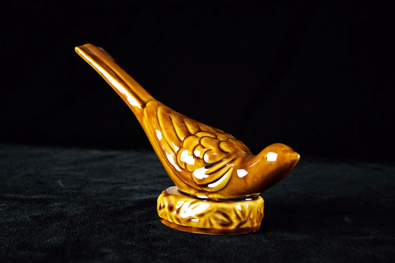 A Van Briggle Pottery Pheasant in Brown High Gloss Glaze