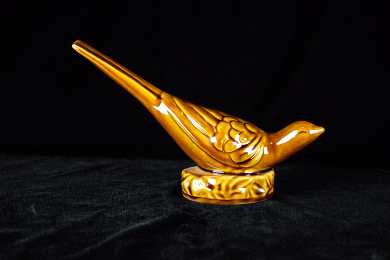 A Van Briggle Pottery Pheasant in Brown High Gloss Glaze