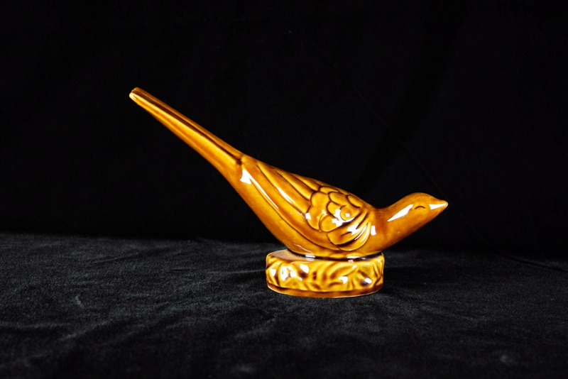 A Van Briggle Pottery Pheasant in Brown High Gloss Glaze