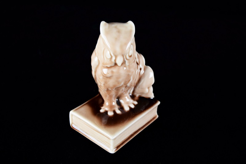 A Rookwood "Owl" Bookend or Paperweight in Soft Brown Gloss Glaze