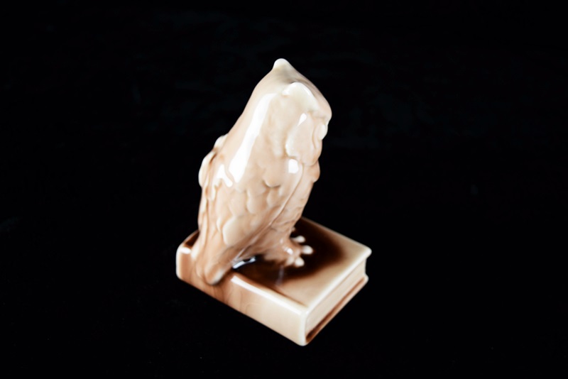 A Rookwood "Owl" Bookend or Paperweight in Soft Brown Gloss Glaze