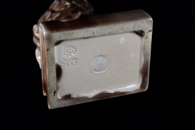 A Rookwood "Owl" Bookend or Paperweight in Soft Brown Gloss Glaze