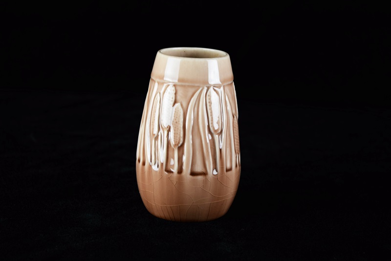 A Rookwood "Cattail" Vase in Soft Brown High Gloss Glaze