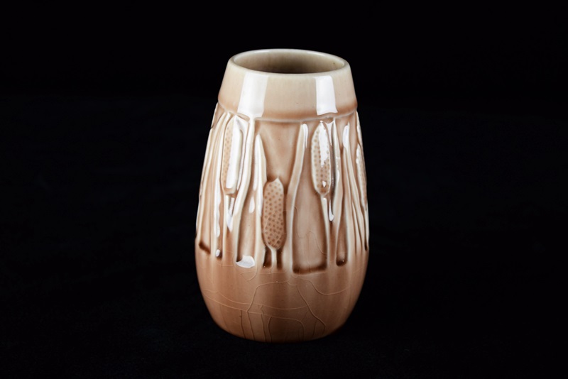 A Rookwood "Cattail" Vase in Soft Brown High Gloss Glaze